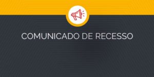 Imagem Acessível: Arte gráfica em tons de amarelo e preto com um calendário e uma caneta dourada ao fundo. No centro, um ícone de megafone em destaque e o título “Comunicado de Recesso”. O texto informa que os atendimentos presenciais e online do SINJUS estarão suspensos de 5 a 8 de dezembro, devido à atividade interna e ao feriado de Nossa Senhora da Conceição, com retorno no dia 9. No rodapé está o logotipo do SINJUS-MG.