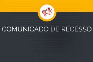 Imagem Acessível: Arte gráfica em tons de amarelo e preto com um calendário e uma caneta dourada ao fundo. No centro, um ícone de megafone em destaque e o título “Comunicado de Recesso”. O texto informa que os atendimentos presenciais e online do SINJUS estarão suspensos de 5 a 8 de dezembro, devido à atividade interna e ao feriado de Nossa Senhora da Conceição, com retorno no dia 9. No rodapé está o logotipo do SINJUS-MG.