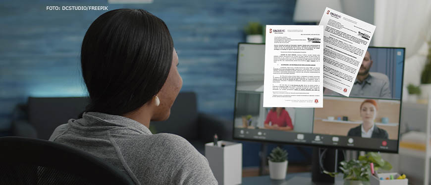 Mulher de pele negra de cabelo liso,comprido e preto usando um computador em um home office. Conteúdo Textual: DEMANDA DOS SERVIDORES SINJUS APRESENTA PROPOSTAS PARA APERFEIÇOAMENTO DO TELETRABALHO NO TJMG