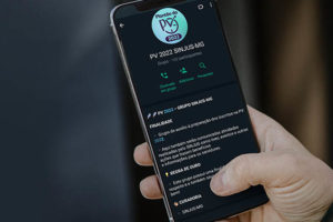 Em uma tela de smartphone é exibida a descrição do grupo da PV 2022 do SINJUS-MG, um dos serviços que será disponibilizado pelo Sindicato durante o Plantão da PV 2022.