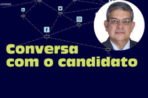 Representação de redes sociais e aplicativos interconectados, abaixo desta imagem há o texto "Conversa com o candidato". Em destaque está a foto do candidato Marcos Pestana, um homem branco com cabelos curtos e grisalhos.