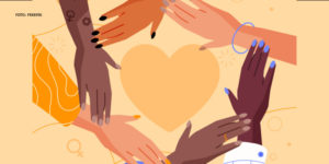 Em um fundo amarelo claro uma ilustração de mulheres negras e brancas juntando suas mãos em forma de círculo de apoio, demonstrando empatia, no centro do círculo um coração amarelo.